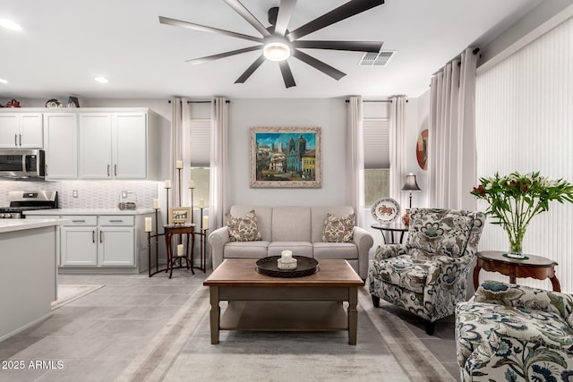 living room with ceiling fan