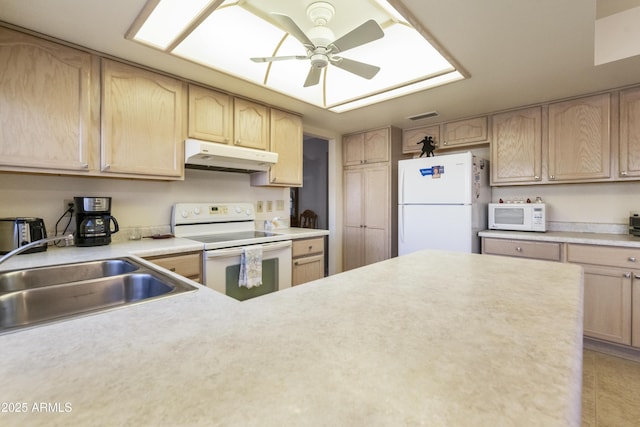 kitchen featuring ceiling fan, light brown cabinetry, sink, and white appliances