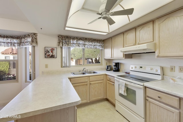 kitchen with ceiling fan, kitchen peninsula, sink, white electric stove, and light brown cabinets