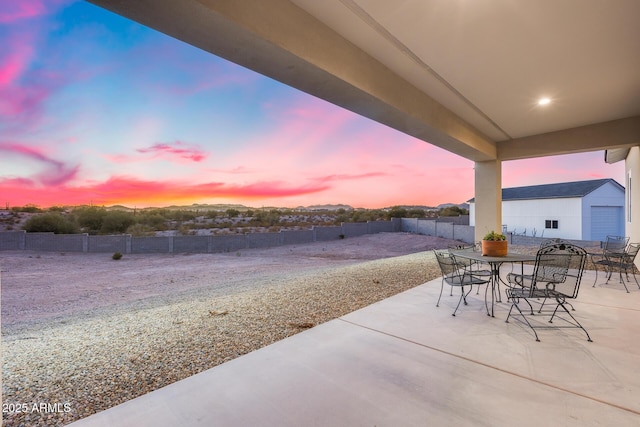 view of patio featuring a fenced backyard and outdoor dining space