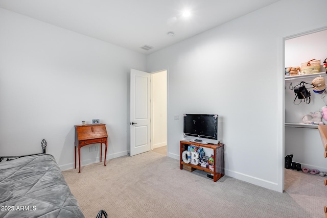 bedroom featuring light carpet, visible vents, and baseboards