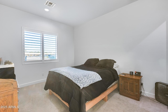 bedroom with light colored carpet, visible vents, baseboards, and recessed lighting