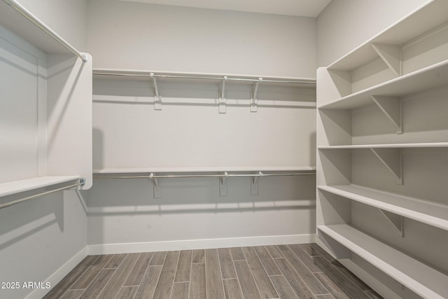 10972 N Hershey St, Surprise, AZ 85388 - spacious closet featuring wood finish floors