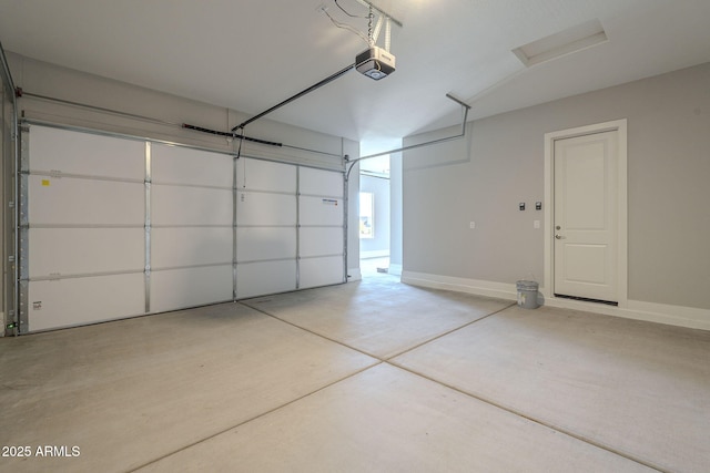 10972 N Hershey St, Surprise, AZ 85388 - garage featuring baseboards and a garage door opener