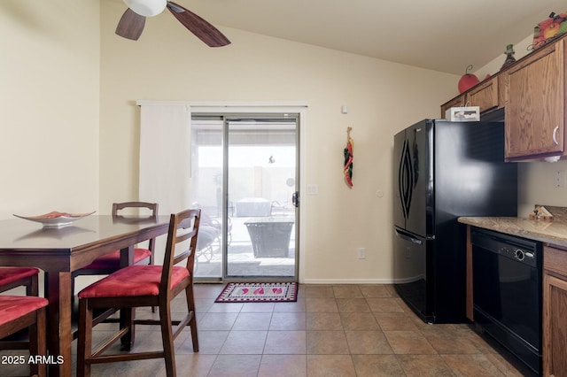 kitchen with ceiling fan, lofted ceiling, tile patterned flooring, and black appliances