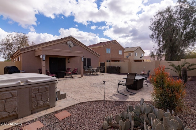 view of patio / terrace with a fire pit