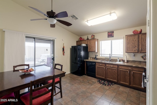 kitchen with sink, vaulted ceiling, black appliances, and ceiling fan