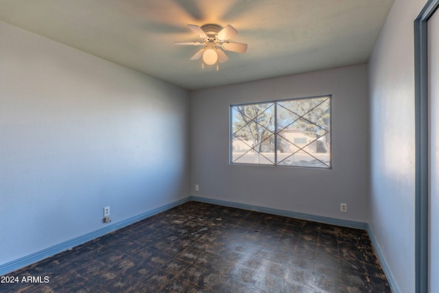 unfurnished room with ceiling fan