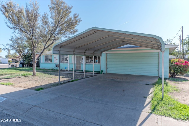 exterior space featuring a carport