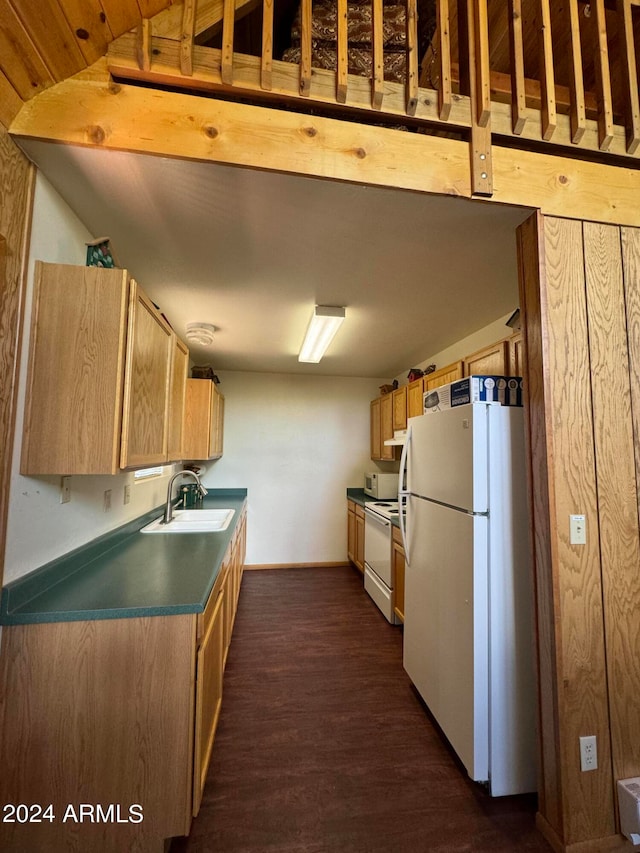 kitchen with dark wood-type flooring, white appliances, sink, and light brown cabinets