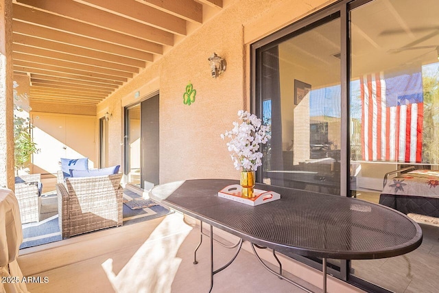 view of patio / terrace with a balcony