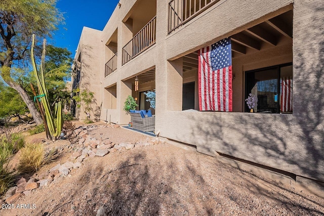 view of home's exterior with stucco siding