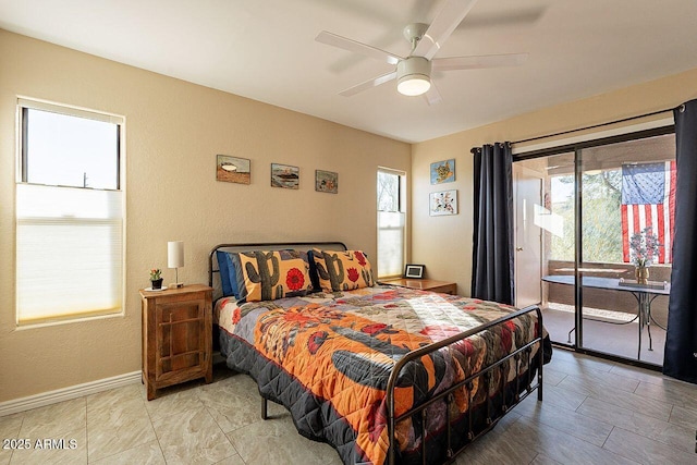 bedroom featuring ceiling fan, access to outside, and baseboards