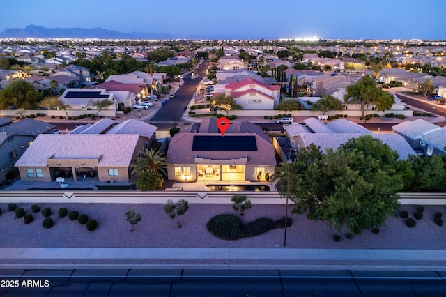 bird's eye view featuring a mountain view and a residential view