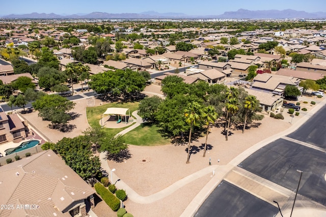 birds eye view of property with a residential view and a mountain view