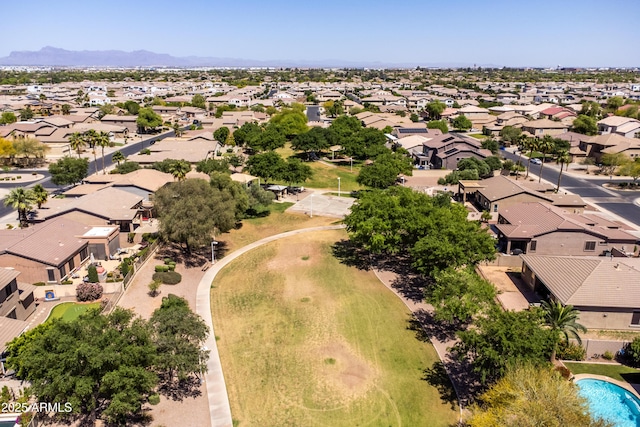 bird's eye view featuring a residential view and a mountain view
