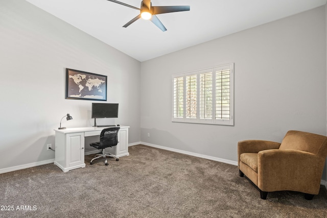 carpeted office with baseboards, vaulted ceiling, and ceiling fan
