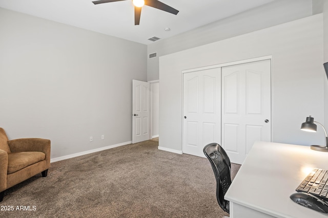 carpeted office featuring baseboards, a ceiling fan, and visible vents