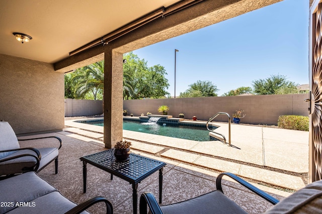 view of patio / terrace with a fenced in pool and a fenced backyard