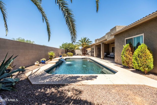 view of pool with a fenced in pool, a fenced backyard, and a patio area