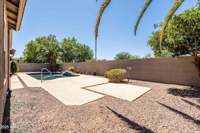 view of patio / terrace featuring a fenced in pool and a fenced backyard