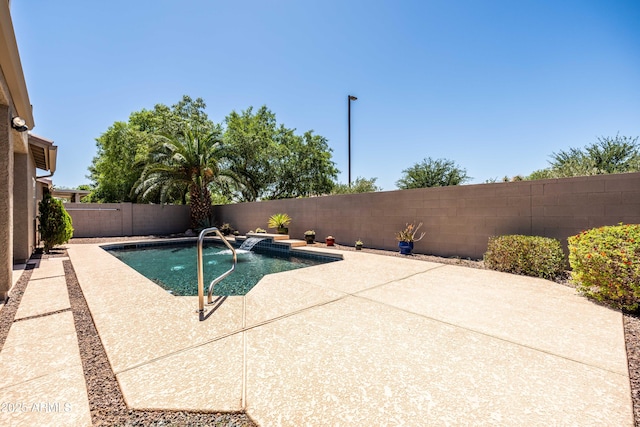 view of swimming pool with a fenced backyard, a fenced in pool, and a patio area