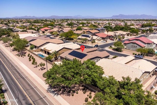 bird's eye view with a residential view and a mountain view