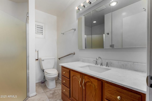 bathroom featuring vanity, toilet, and an enclosed shower