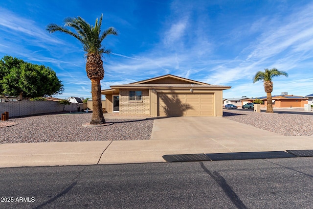 ranch-style house featuring a garage