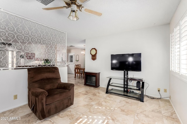 living room featuring ceiling fan