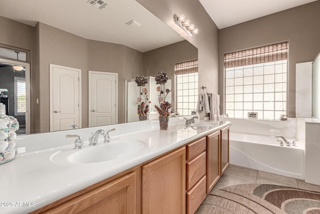 25845 N 44th Ave, Phoenix, AZ 85083 - full bath with double vanity, visible vents, a sink, and a bath