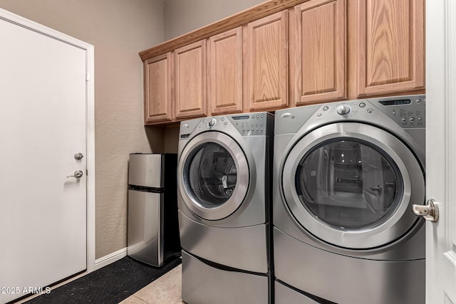 25845 N 44th Ave, Phoenix, AZ 85083 - laundry area featuring washing machine and clothes dryer, baseboards, and cabinet space