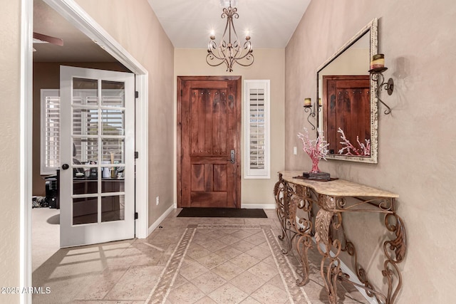 25845 N 44th Ave, Phoenix, AZ 85083 - foyer with baseboards and a notable chandelier