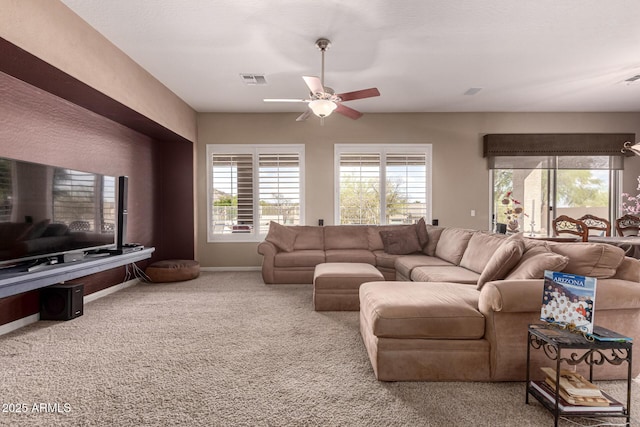 25845 N 44th Ave, Phoenix, AZ 85083 - living room with visible vents, a ceiling fan, baseboards, and carpet flooring