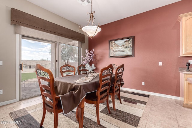 25845 N 44th Ave, Phoenix, AZ 85083 - dining space with baseboards, light tile patterned flooring, and visible vents