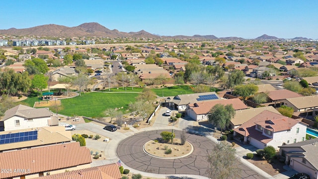 drone / aerial view with a residential view and a mountain view