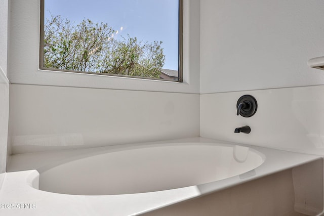 full bathroom with a tub to relax in