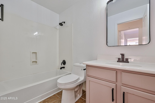 bathroom with tile patterned floors, shower / bathing tub combination, toilet, and vanity