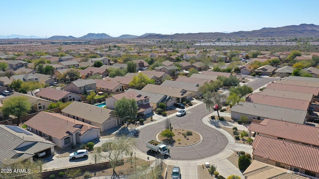 birds eye view of property with a residential view and a mountain view