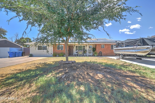 ranch-style house with a patio area