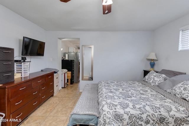 7830 N 17th Ave, Phoenix, AZ 85021 - bedroom featuring light tile patterned floors, freestanding refrigerator, and a ceiling fan