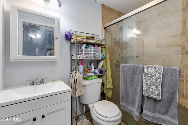 7830 N 17th Ave, Phoenix, AZ 85021 - bathroom featuring vanity, a tile shower, and toilet