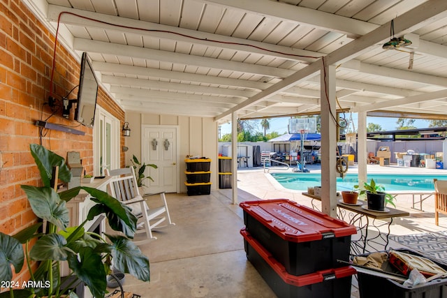 view of patio / terrace with a swimming pool