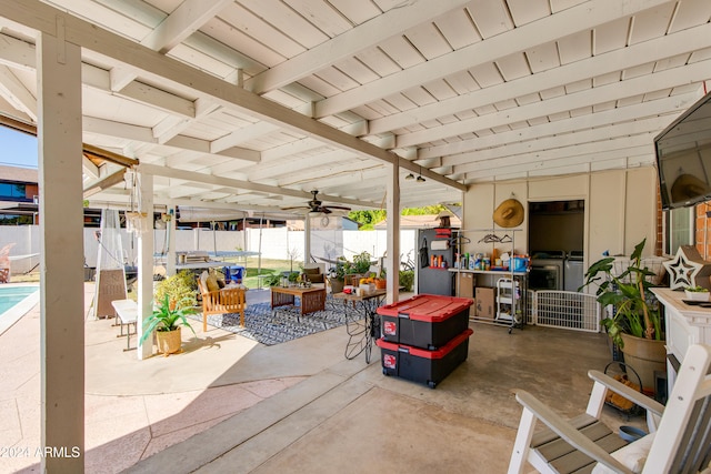 view of patio with a fenced in pool