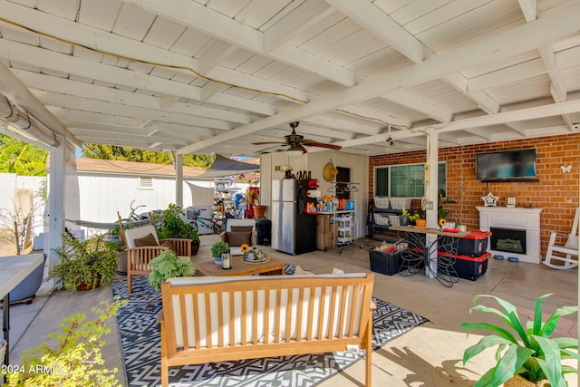 view of patio / terrace with ceiling fan and an outdoor hangout area