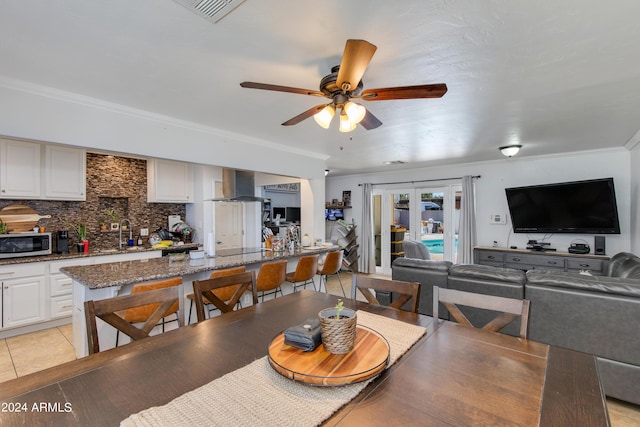 7830 N 17th Ave, Phoenix, AZ 85021 - dining room featuring ornamental molding, ceiling fan, and light tile patterned floors