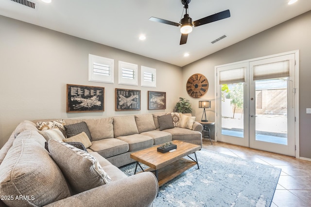 living room with visible vents, vaulted ceiling, french doors, and ceiling fan