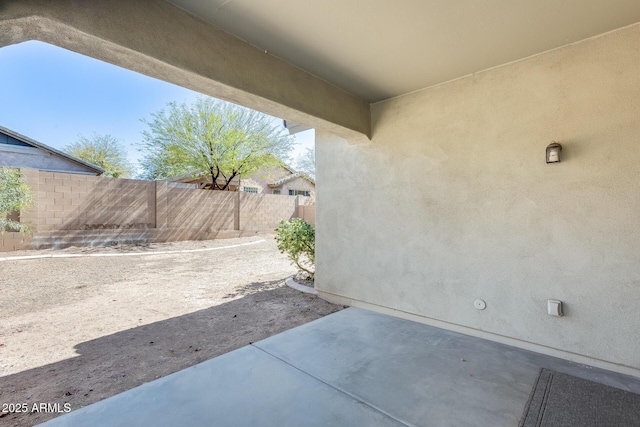 view of patio / terrace with fence