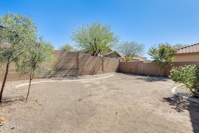 view of yard featuring a fenced backyard