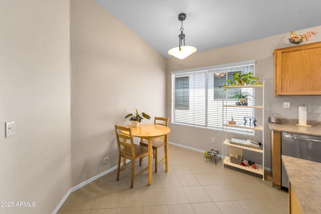 2221 E Union Hills Dr Unit 148, Phoenix, AZ 85024 - dining room with baseboards and vaulted ceiling